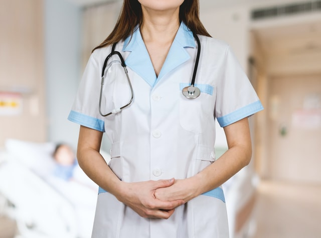 A medical professional with a stethoscope